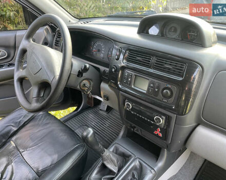 Черный Мицубиси Паджеро Спорт, объемом двигателя 3 л и пробегом 244 тыс. км за 7800 $, фото 14 на Automoto.ua