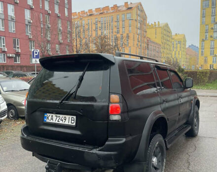 Черный Мицубиси Паджеро Спорт, объемом двигателя 3 л и пробегом 300 тыс. км за 5300 $, фото 4 на Automoto.ua