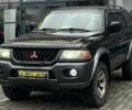Черный Мицубиси Паджеро Спорт, объемом двигателя 3 л и пробегом 335 тыс. км за 8800 $, фото 2 на Automoto.ua