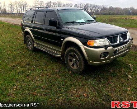 Чорний Міцубісі Паджеро Спорт, об'ємом двигуна 3 л та пробігом 383 тис. км за 7000 $, фото 1 на Automoto.ua