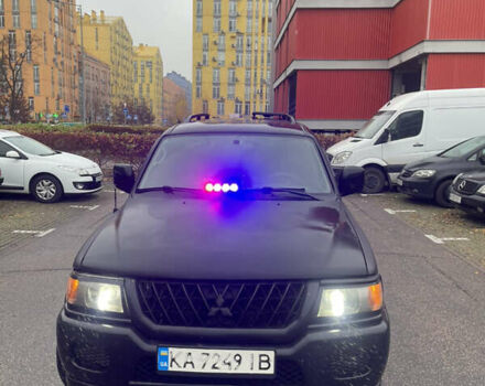 Черный Мицубиси Паджеро Спорт, объемом двигателя 3 л и пробегом 300 тыс. км за 5300 $, фото 7 на Automoto.ua