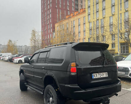 Черный Мицубиси Паджеро Спорт, объемом двигателя 3 л и пробегом 300 тыс. км за 5300 $, фото 2 на Automoto.ua
