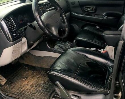 Черный Мицубиси Паджеро Спорт, объемом двигателя 3 л и пробегом 383 тыс. км за 7000 $, фото 6 на Automoto.ua