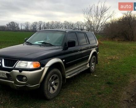 Черный Мицубиси Паджеро Спорт, объемом двигателя 3 л и пробегом 383 тыс. км за 7000 $, фото 1 на Automoto.ua