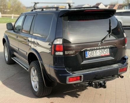 Мицубиси Паджеро Спорт 2004 в Сумах на Automoto.ua Черный Мицубиси Паджеро Спорт, объемом двигателя 0 л и пробегом 289 тыс. км за 3000 $, фото 4 на Automoto.ua