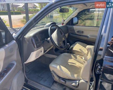 Черный Мицубиси Паджеро Спорт, объемом двигателя 2.97 л и пробегом 408 тыс. км за 7200 $, фото 6 на Automoto.ua