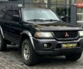 Черный Мицубиси Паджеро Спорт, объемом двигателя 3 л и пробегом 335 тыс. км за 8800 $, фото 1 на Automoto.ua