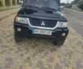 Чорний Міцубісі Паджеро Спорт, об'ємом двигуна 3 л та пробігом 349 тис. км за 9100 $, фото 9 на Automoto.ua