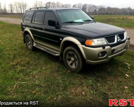 Чорний Міцубісі Паджеро Спорт, об'ємом двигуна 3 л та пробігом 383 тис. км за 7000 $, фото 3 на Automoto.ua