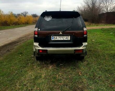 Черный Мицубиси Паджеро Спорт, объемом двигателя 3 л и пробегом 383 тыс. км за 7000 $, фото 4 на Automoto.ua
