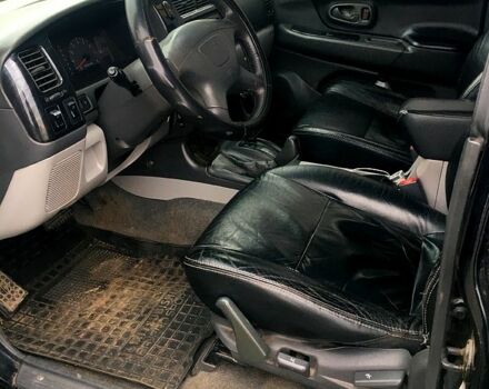 Чорний Міцубісі Паджеро Спорт, об'ємом двигуна 3 л та пробігом 383 тис. км за 7000 $, фото 7 на Automoto.ua