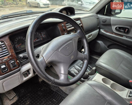 Черный Мицубиси Паджеро Спорт, объемом двигателя 2.97 л и пробегом 375 тыс. км за 6450 $, фото 10 на Automoto.ua