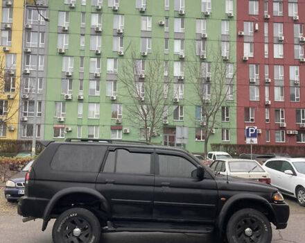 Черный Мицубиси Паджеро Спорт, объемом двигателя 3 л и пробегом 300 тыс. км за 5300 $, фото 5 на Automoto.ua