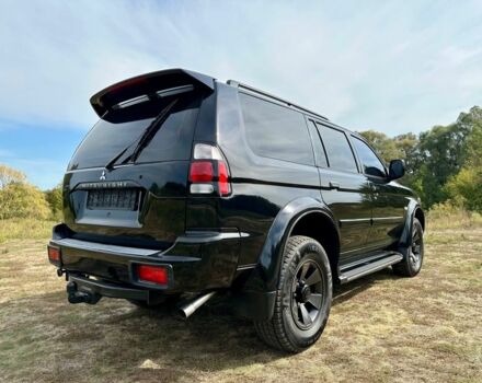 Черный Мицубиси Паджеро Спорт, объемом двигателя 3 л и пробегом 250 тыс. км за 8300 $, фото 7 на Automoto.ua