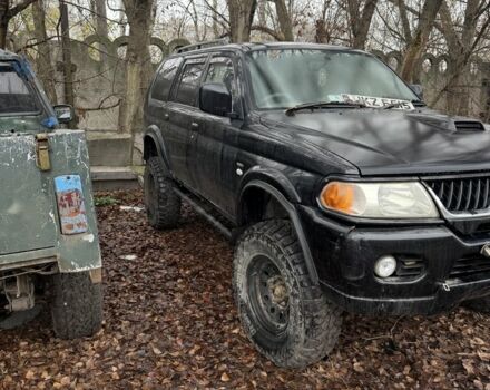 Черный Мицубиси Паджеро Спорт, объемом двигателя 2.5 л и пробегом 200 тыс. км за 4200 $, фото 2 на Automoto.ua