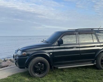 Черный Мицубиси Паджеро Спорт, объемом двигателя 3 л и пробегом 239 тыс. км за 9900 $, фото 3 на Automoto.ua