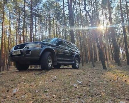 Чорний Міцубісі Паджеро Спорт, об'ємом двигуна 3 л та пробігом 270 тис. км за 9200 $, фото 4 на Automoto.ua