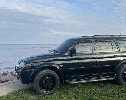 Черный Мицубиси Паджеро Спорт, объемом двигателя 3 л и пробегом 239 тыс. км за 9900 $, фото 2 на Automoto.ua