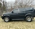 Чорний Міцубісі Паджеро Спорт, об'ємом двигуна 3 л та пробігом 200 тис. км за 5500 $, фото 2 на Automoto.ua