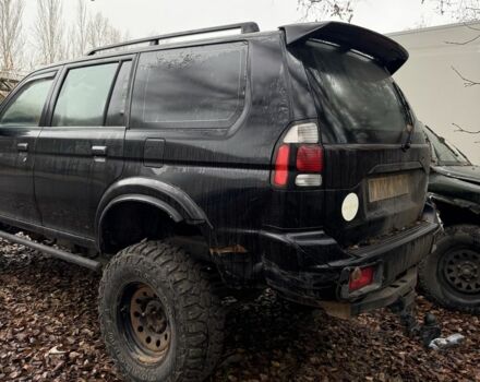 Черный Мицубиси Паджеро Спорт, объемом двигателя 2.5 л и пробегом 200 тыс. км за 4200 $, фото 1 на Automoto.ua