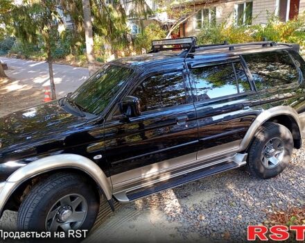 Чорний Міцубісі Паджеро Спорт, об'ємом двигуна 3 л та пробігом 180 тис. км за 8200 $, фото 1 на Automoto.ua