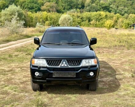 Черный Мицубиси Паджеро Спорт, объемом двигателя 3 л и пробегом 250 тыс. км за 8300 $, фото 2 на Automoto.ua
