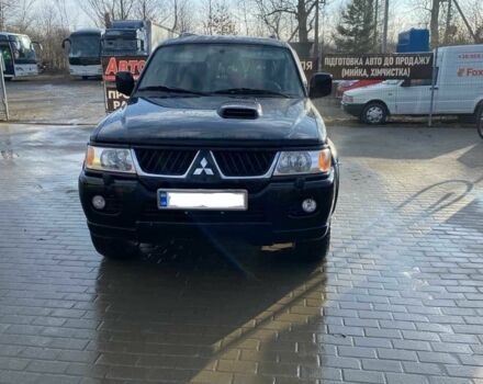 Чорний Міцубісі Паджеро Спорт, об'ємом двигуна 2.5 л та пробігом 209 тис. км за 8300 $, фото 1 на Automoto.ua