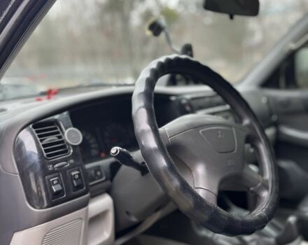 Чорний Міцубісі Паджеро Спорт, об'ємом двигуна 3 л та пробігом 200 тис. км за 5500 $, фото 12 на Automoto.ua