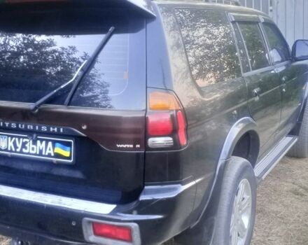 Чорний Міцубісі Паджеро Спорт, об'ємом двигуна 2.5 л та пробігом 300 тис. км за 6500 $, фото 5 на Automoto.ua