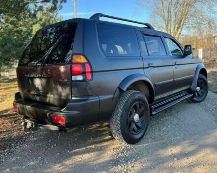 Черный Мицубиси Паджеро Спорт, объемом двигателя 2.5 л и пробегом 239 тыс. км за 2950 $, фото 4 на Automoto.ua