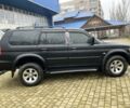 Чорний Міцубісі Паджеро Спорт, об'ємом двигуна 3 л та пробігом 200 тис. км за 5500 $, фото 6 на Automoto.ua