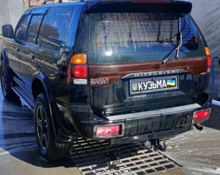 Чорний Міцубісі Паджеро Спорт, об'ємом двигуна 2.5 л та пробігом 300 тис. км за 6500 $, фото 1 на Automoto.ua