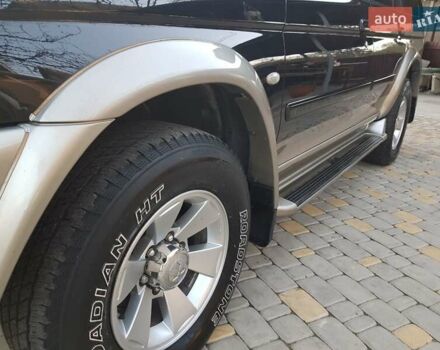 Черный Мицубиси Паджеро Спорт, объемом двигателя 3 л и пробегом 176 тыс. км за 8950 $, фото 4 на Automoto.ua