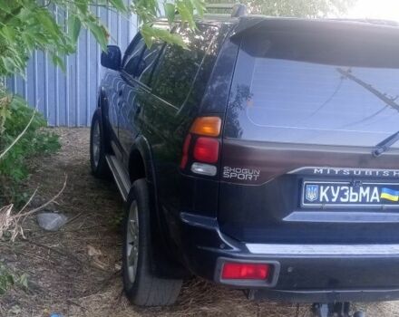 Чорний Міцубісі Паджеро Спорт, об'ємом двигуна 2.5 л та пробігом 300 тис. км за 6500 $, фото 6 на Automoto.ua