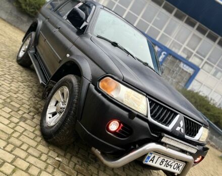 Чорний Міцубісі Паджеро Спорт, об'ємом двигуна 3 л та пробігом 200 тис. км за 5500 $, фото 7 на Automoto.ua