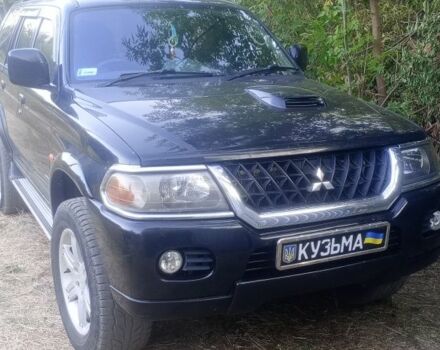 Чорний Міцубісі Паджеро Спорт, об'ємом двигуна 2.5 л та пробігом 300 тис. км за 6500 $, фото 3 на Automoto.ua
