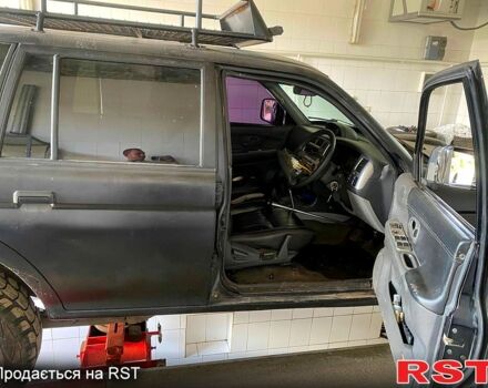 Черный Мицубиси Паджеро Спорт, объемом двигателя 3 л и пробегом 100 тыс. км за 4500 $, фото 4 на Automoto.ua