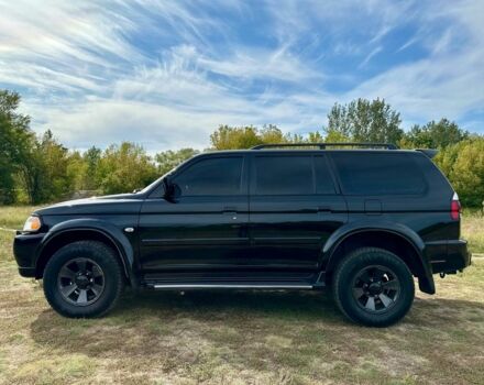 Черный Мицубиси Паджеро Спорт, объемом двигателя 3 л и пробегом 250 тыс. км за 8300 $, фото 4 на Automoto.ua