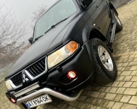 Чорний Міцубісі Паджеро Спорт, об'ємом двигуна 3 л та пробігом 200 тис. км за 5500 $, фото 1 на Automoto.ua