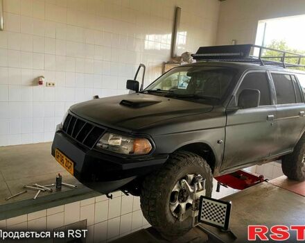Черный Мицубиси Паджеро Спорт, объемом двигателя 3 л и пробегом 100 тыс. км за 4500 $, фото 5 на Automoto.ua