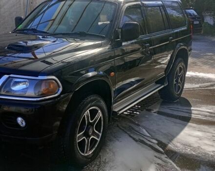 Чорний Міцубісі Паджеро Спорт, об'ємом двигуна 2.5 л та пробігом 300 тис. км за 6500 $, фото 2 на Automoto.ua