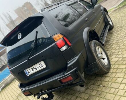 Чорний Міцубісі Паджеро Спорт, об'ємом двигуна 3 л та пробігом 200 тис. км за 5500 $, фото 5 на Automoto.ua