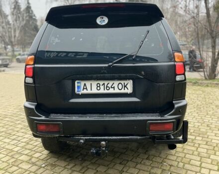 Чорний Міцубісі Паджеро Спорт, об'ємом двигуна 3 л та пробігом 200 тис. км за 5500 $, фото 4 на Automoto.ua