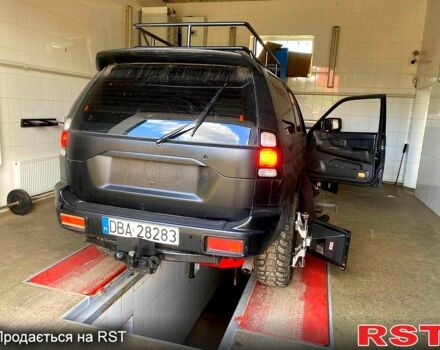 Черный Мицубиси Паджеро Спорт, объемом двигателя 3 л и пробегом 100 тыс. км за 4500 $, фото 3 на Automoto.ua