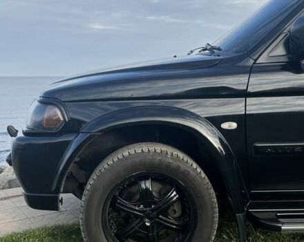 Черный Мицубиси Паджеро Спорт, объемом двигателя 3 л и пробегом 239 тыс. км за 9900 $, фото 5 на Automoto.ua