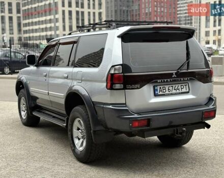 Черный Мицубиси Паджеро Спорт, объемом двигателя 2.97 л и пробегом 285 тыс. км за 7350 $, фото 2 на Automoto.ua