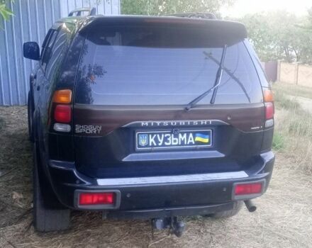 Чорний Міцубісі Паджеро Спорт, об'ємом двигуна 2.5 л та пробігом 300 тис. км за 6500 $, фото 4 на Automoto.ua