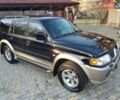 Черный Мицубиси Паджеро Спорт, объемом двигателя 3 л и пробегом 176 тыс. км за 8950 $, фото 3 на Automoto.ua