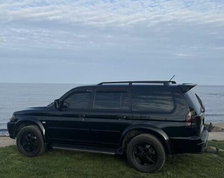 Черный Мицубиси Паджеро Спорт, объемом двигателя 3 л и пробегом 239 тыс. км за 9900 $, фото 1 на Automoto.ua