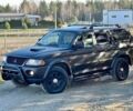 Черный Мицубиси Паджеро Спорт, объемом двигателя 2.5 л и пробегом 239 тыс. км за 2950 $, фото 1 на Automoto.ua